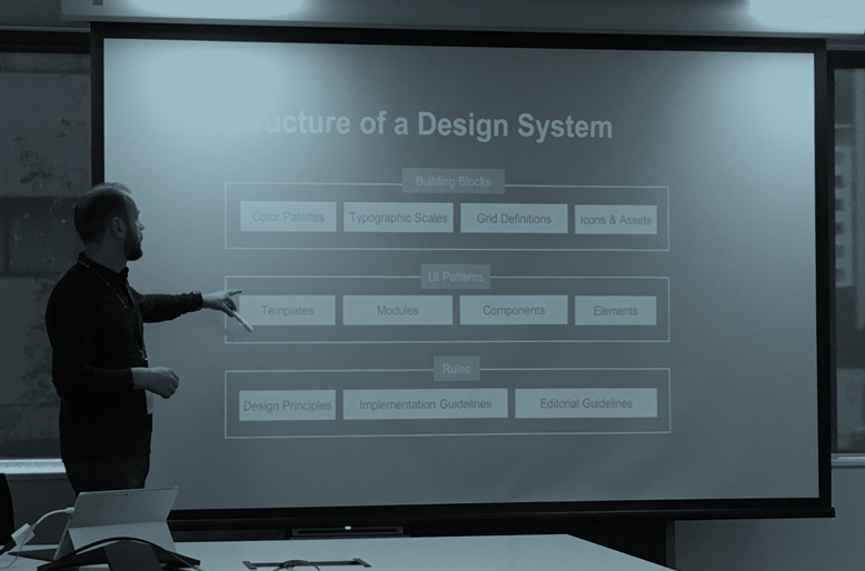 Mark Kirkpatrick presenting at government design system working grooup meet-up - slide suppplied by UXPin